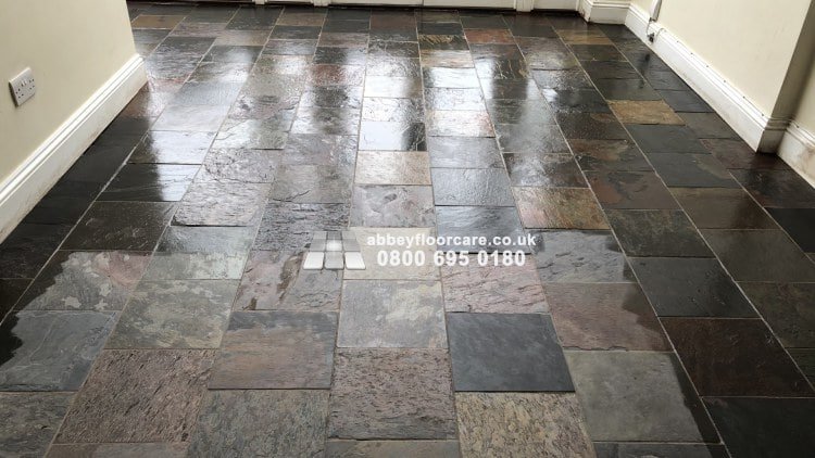 Sealer being applied to cleaned slate floor tiles in Barnes