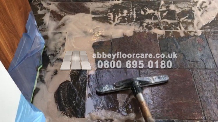 Wet vacuum extracting dirty slurry from a Barnes slate floor
