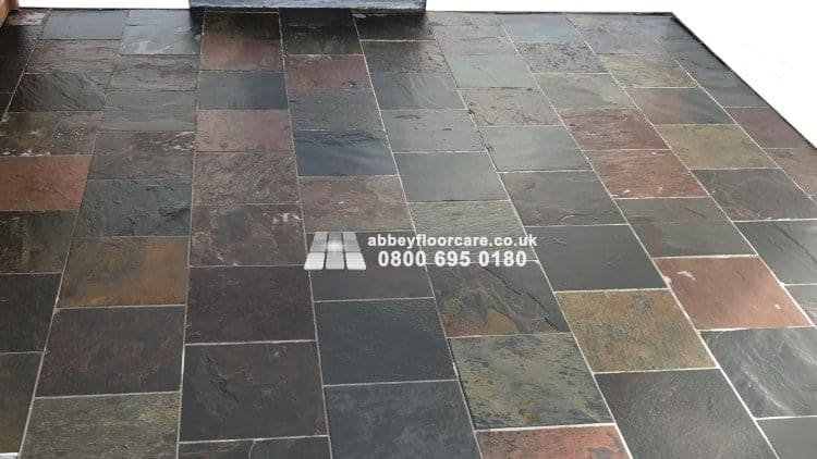 Finished Barnes slate floor with richer colour and low-sheen protection